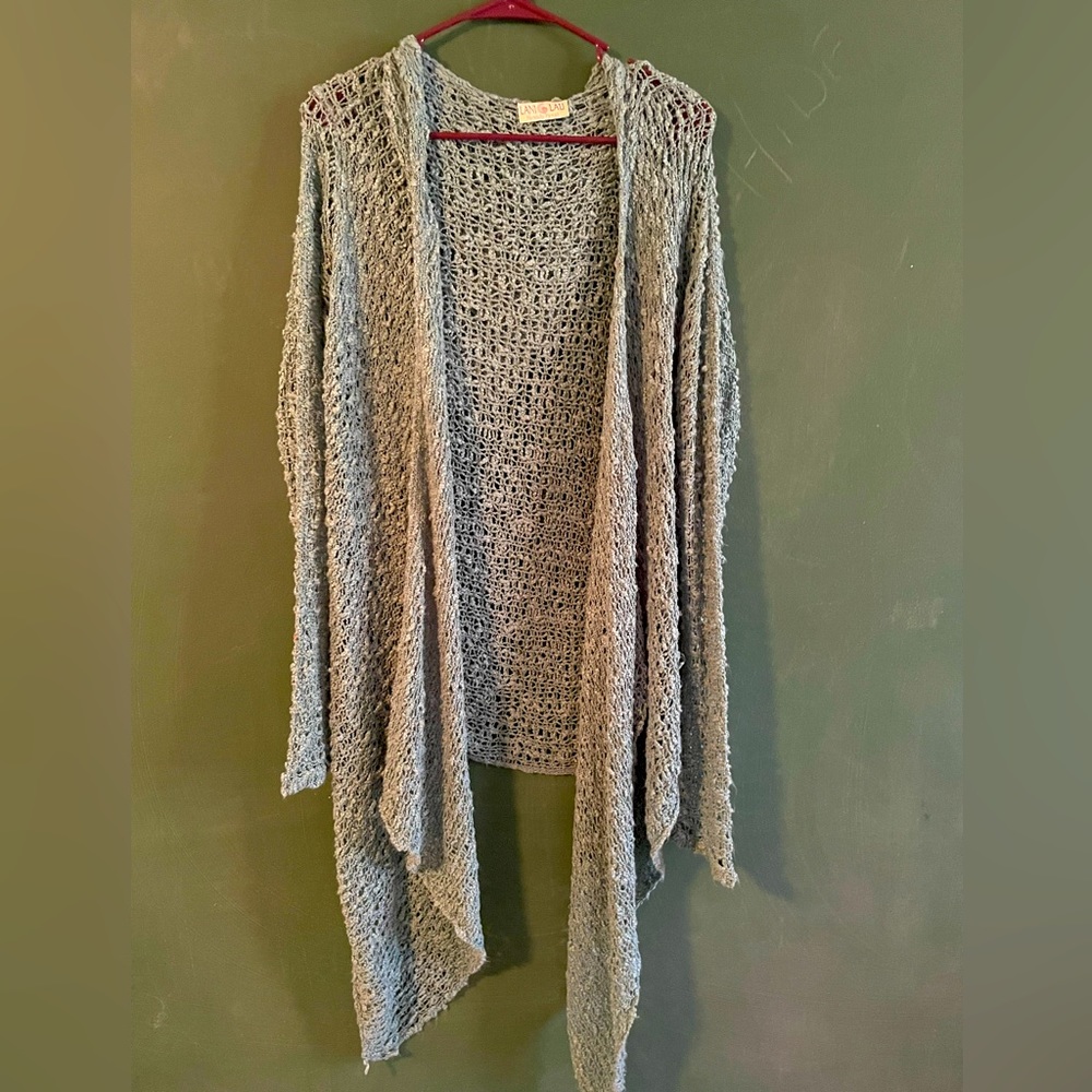 Teal blue crocheted wrap.